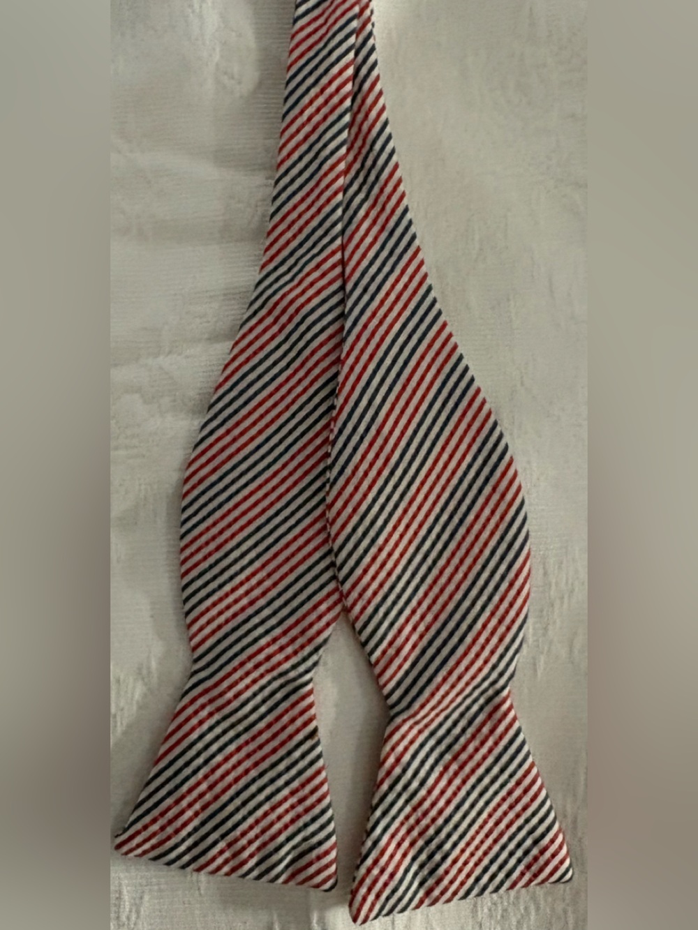 Mark Pendleton Striped Seersucker Self-Tie Bow Tie in Red, White & Blue